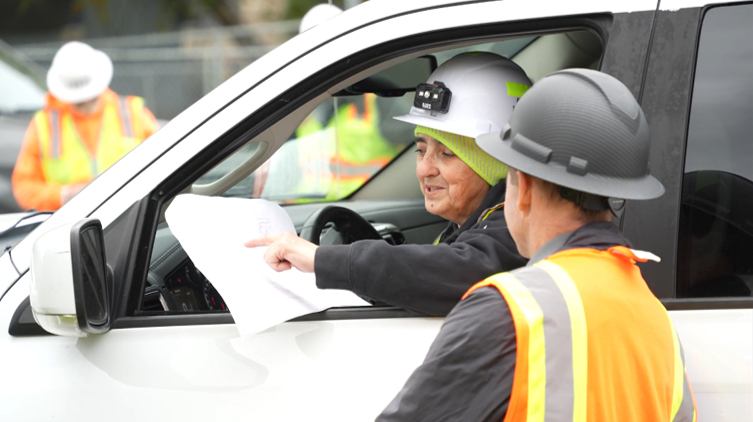 Two field techs doing upgrades on GCI's internet network in Anchorage.