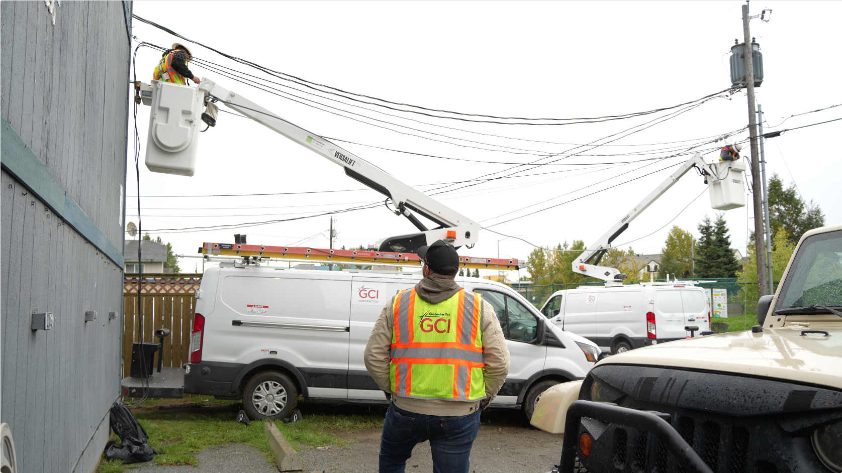 Technicians upgrading Harmonic equipment. 
