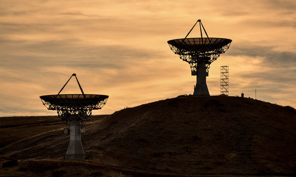 Wireless satellites at sunset